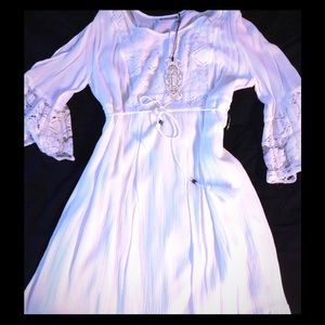 Open cut long sleeved dress